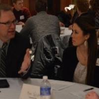 Mentor educator advises current students at a GVSU Education Alumni Network event